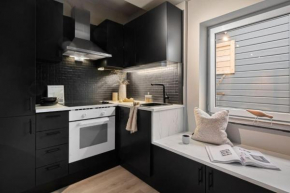 Sentral studio-leilighet